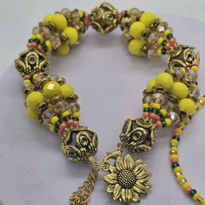 Oshun Ololodi Pulsera Bracelet with Sunflower Pendant and Decorative Beads in Yellow and Brown Tones