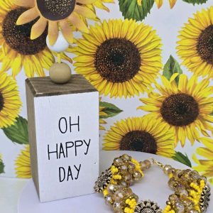 Pulsera/Ilde para orisha Oshun adornado con girasoles